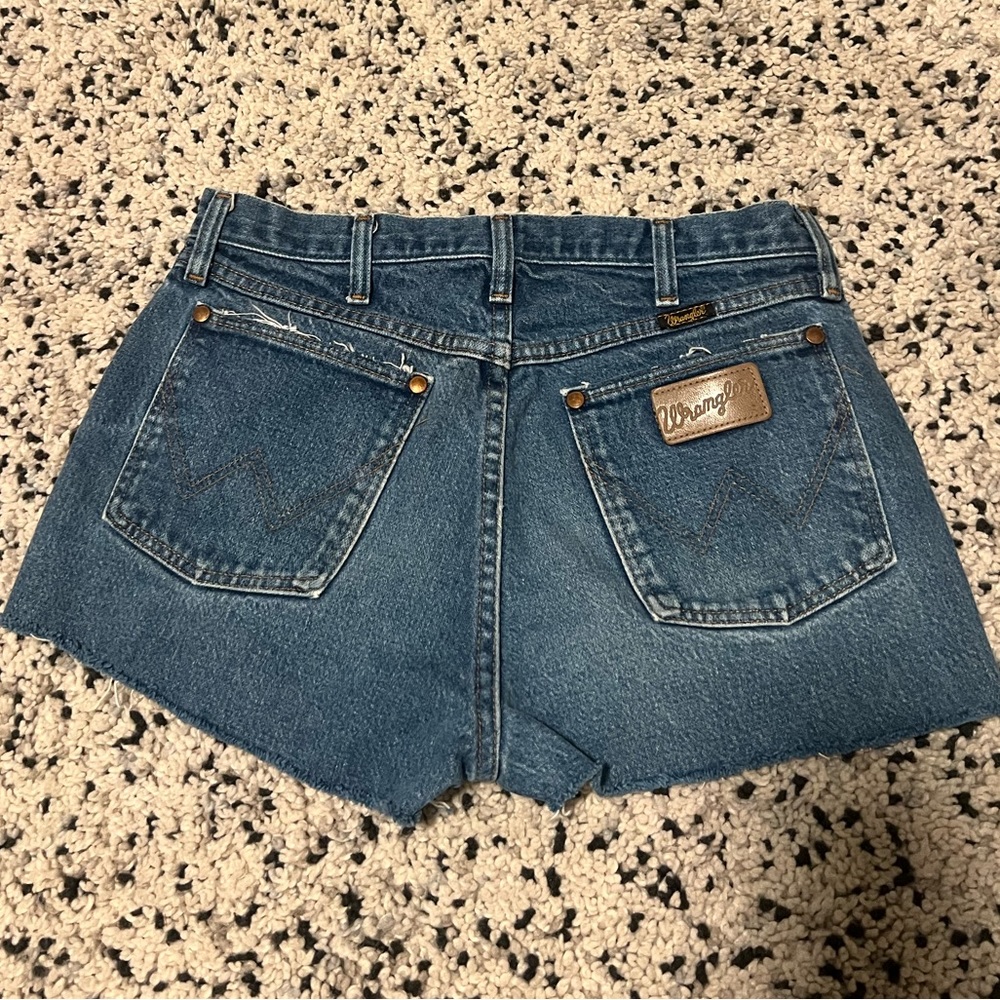 Vintage Wrangler cowboy cut jeans cut to shorts.
